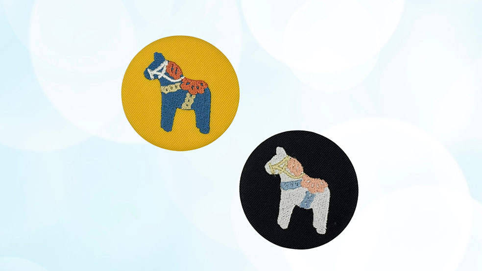 LifTe北欧の暮らし 1月27日(火)から東京都美術館(東京・上野公園)で開催される展覧会「スウェーデン絵画 北欧の光、日常のかがやき」で販売される刺繍ブローチ(全2種)